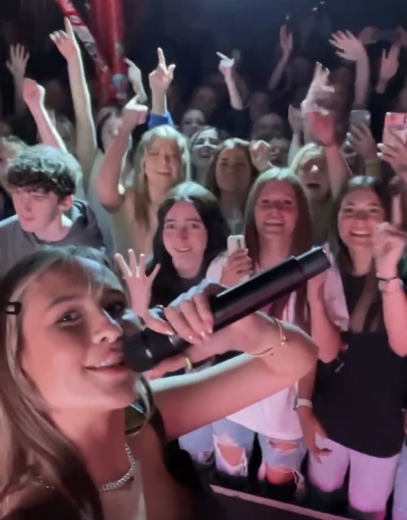 Brooklyn front row at Kilby Court while Mimi Webb sings to the crowd
