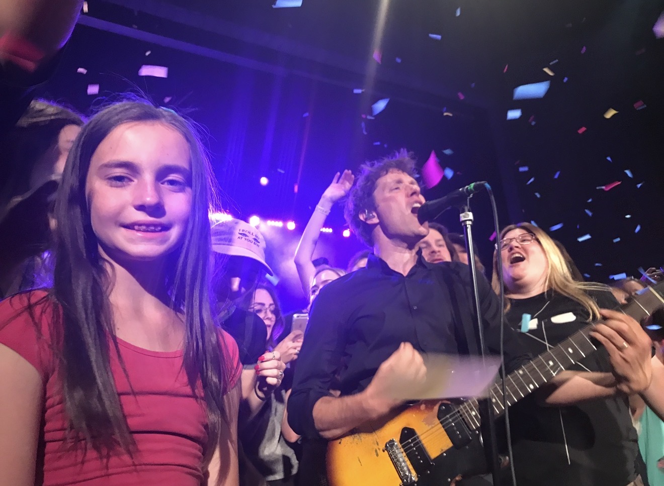Brooklyn at one of her first concerts, confetti falling